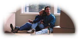 Couple enjoying their newly bought home.